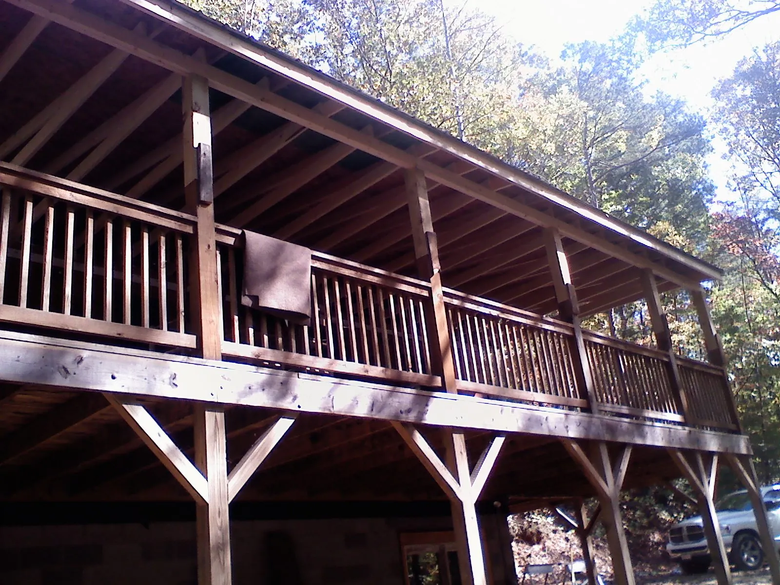 Timber framing under a new elevated porch and deck — Roof Leak Repair in South Sioux City by Roofing Brothers
